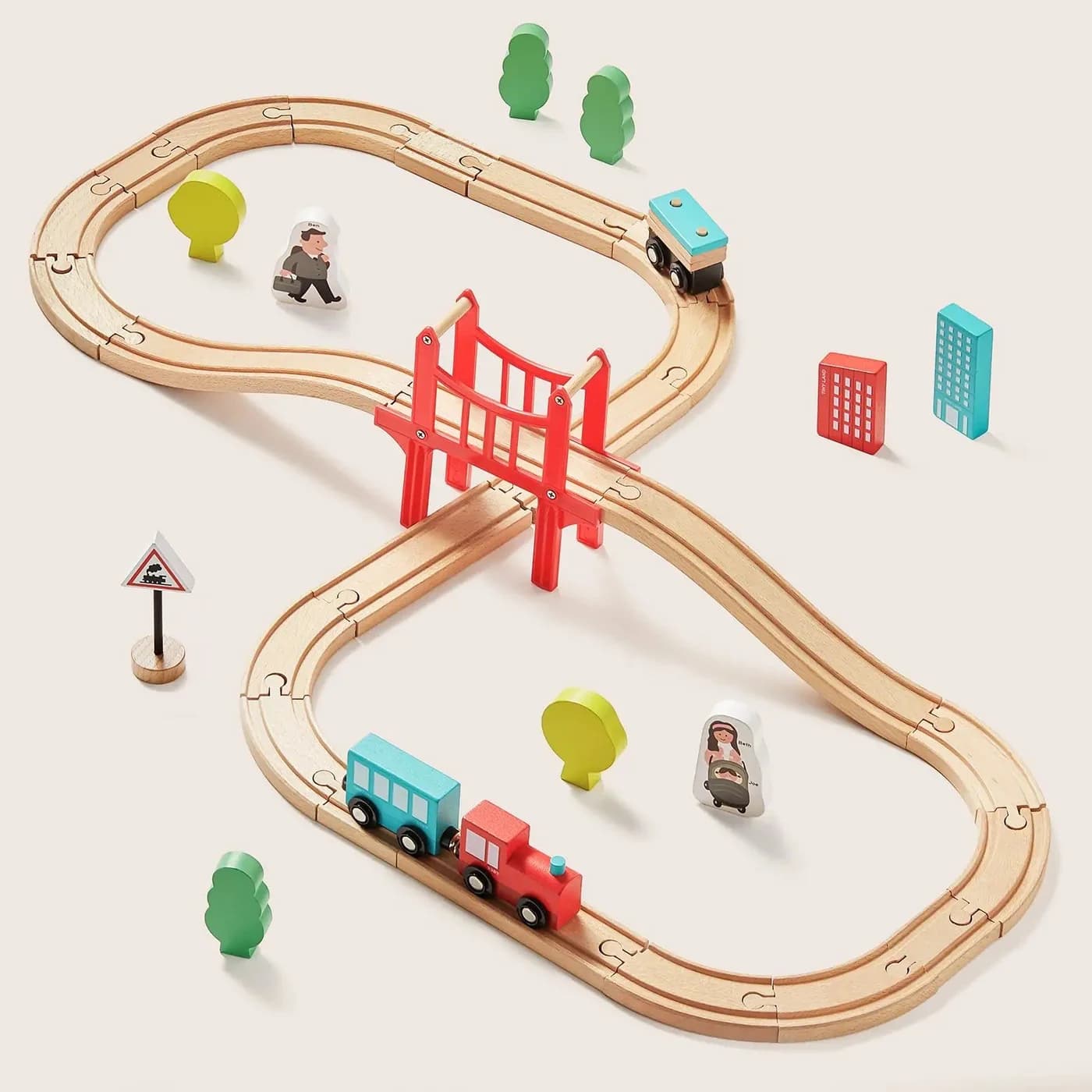 Tiny Land 39-piece wooden train set with tracks, a red bridge, trees and small trains